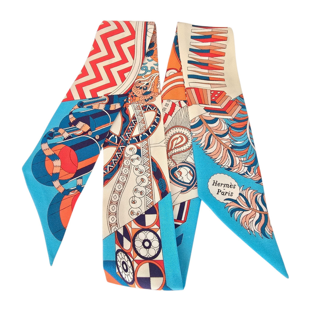 Hermes Silk Twilly De L’Ombrelle Aux Duels Blue Potiron and Creme HERMES