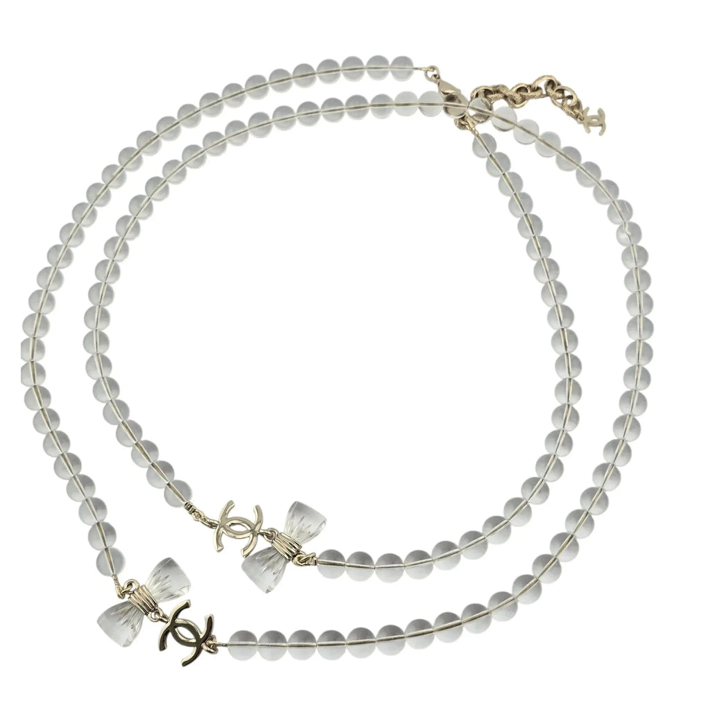 Chanel CC Clear Bead Long Bow Necklace 2025 CHANEL
